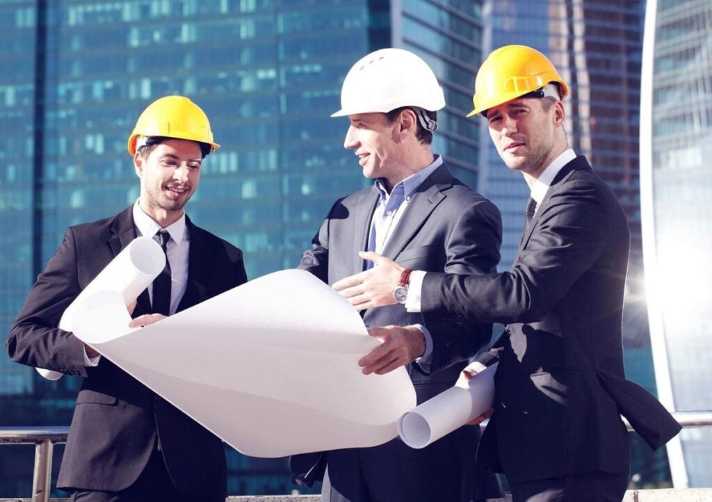 Al Ammary team reviewing project plans on site